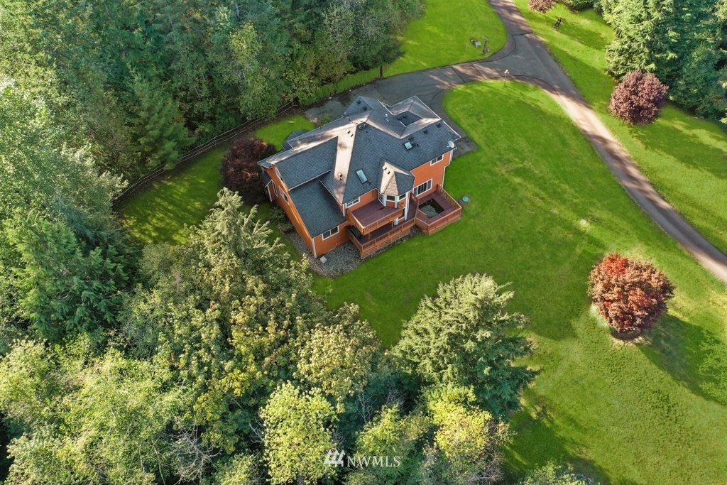 10606 Wagner Road Snohomish, WA 98290 - Photo 30 of 40 an aerial view of a house with garden space and trees all around
