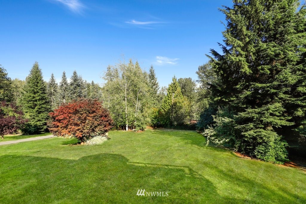 10606 Wagner Road Snohomish, WA 98290 - Photo 32 of 40 a view of a trees with a garden