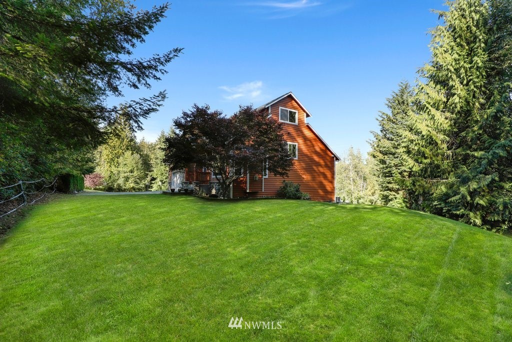 10606 Wagner Road Snohomish, WA 98290 - Photo 35 of 40 a view of a house with a yard