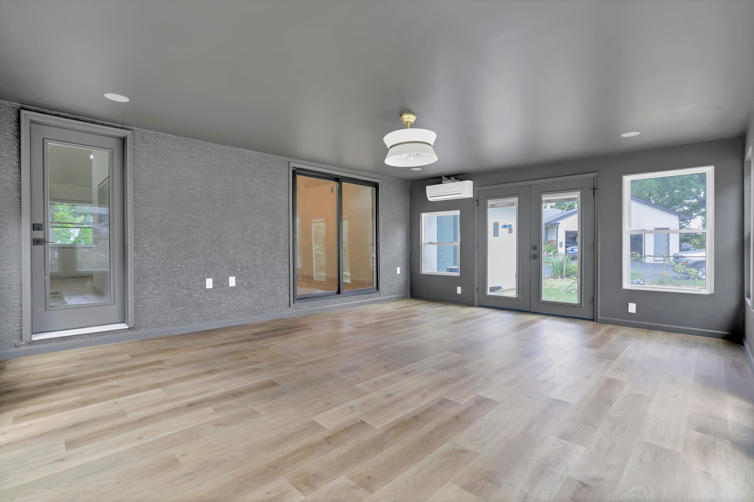 1285 Kingsgate Road Columbus, OH 43221 - Photo 39 of 56 Four season room! Complete with split system and durable LVP flooring - and the windows !!!!