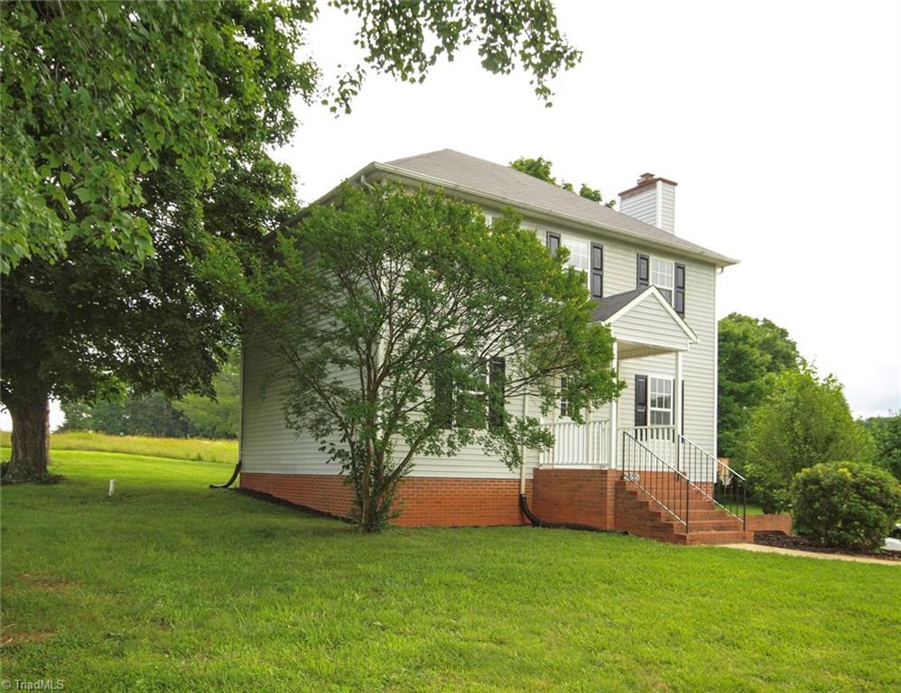 5855 Phillips Bridge Road Lewisville, NC 27023 - Photo 2 of 27 5855 Phillips Bridge Lewisville, North Carolina 27023: Great flat yard