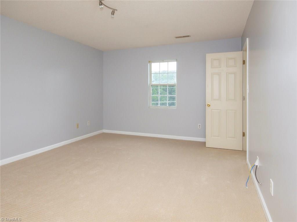 5855 Phillips Bridge Road Lewisville, NC 27023 - Photo 13 of 27 5855 Phillips Bridge Lewisville, North Carolina 27023: Spacious bedroom