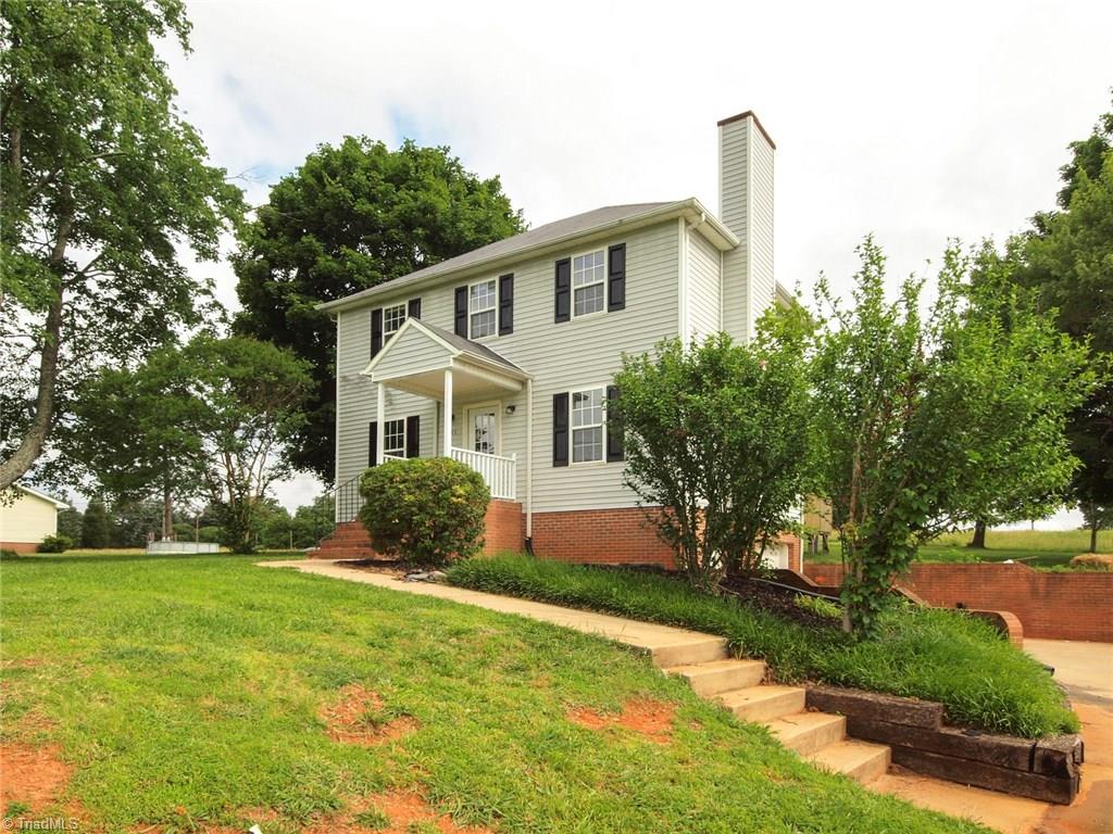 5855 Phillips Bridge Road Lewisville, NC 27023 - Photo 3 of 27 5855 Phillips Bridge Lewisville, North Carolina 27023: Charming from the outside in!