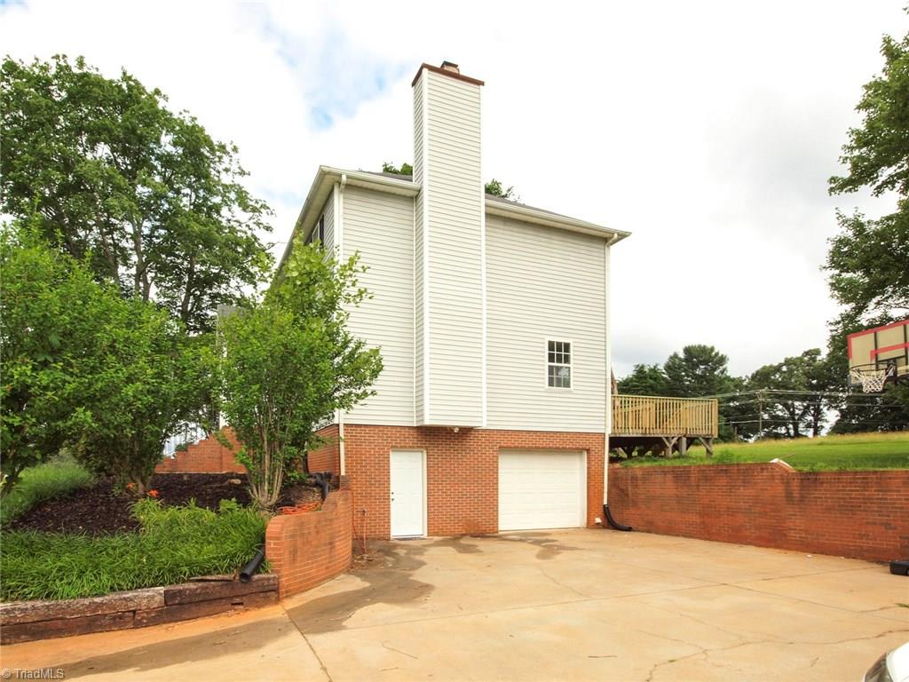 5855 Phillips Bridge Road Lewisville, NC 27023 - Photo 4 of 27 5855 Phillips Bridge Lewisville, North Carolina 27023: Garage and basement access