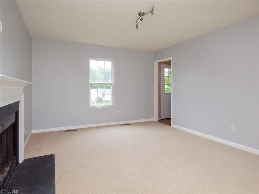 5855 Phillips Bridge Road Lewisville, NC 27023 - Photo 5 of 27 5855 Phillips Bridge Lewisville, North Carolina 27023: Great use of space in this living room!