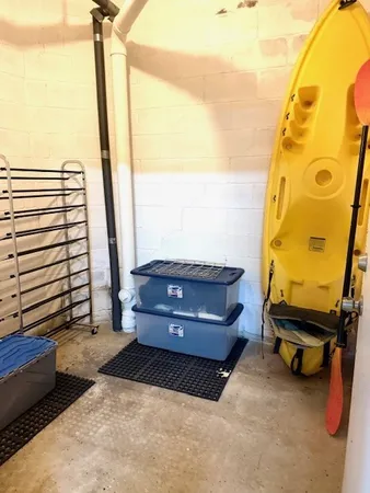 a view of garage with furniture