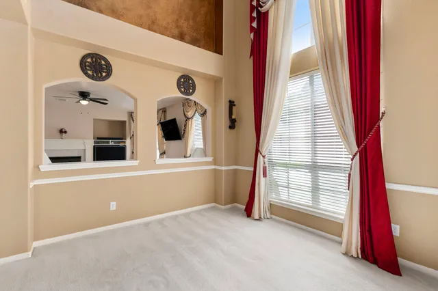 a view of entryway and hall with dining room