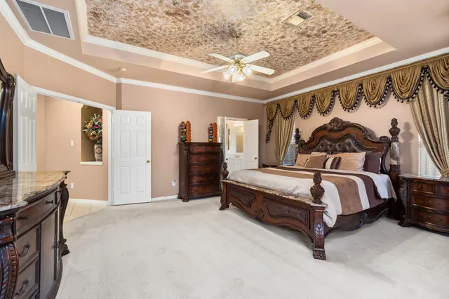 a bathroom with a sink a large mirror and a bathtub