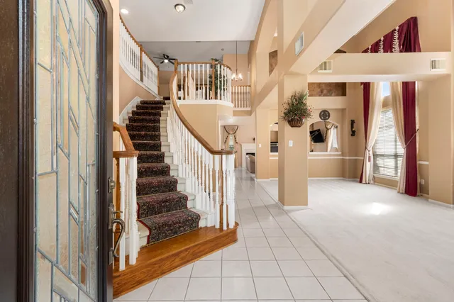 a view of an entryway with staircase