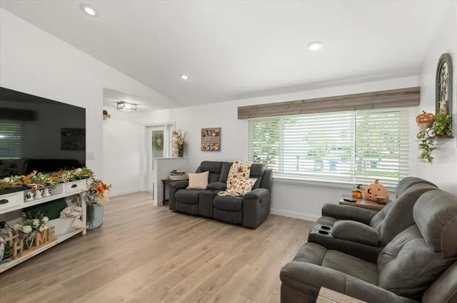 a kitchen that has a lot of stuff and cabinets