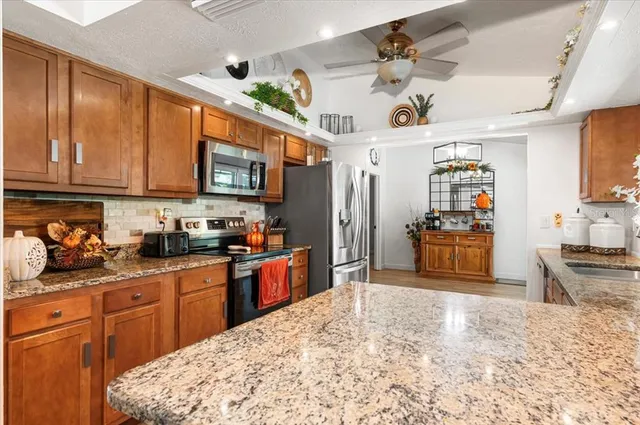 a living room with furniture and a walk in closet