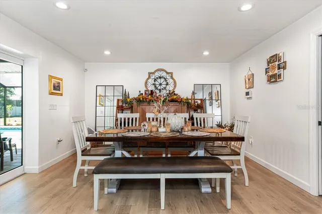 a bedroom with a bed dresser and a window