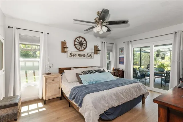 a bathroom with a bathtub sink vanity mirror and