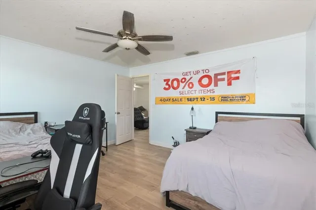 an aerial view of a house with outdoor space