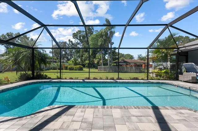 a view of a swimming pool and outdoor space