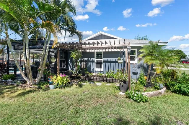 a view of a house with a garden