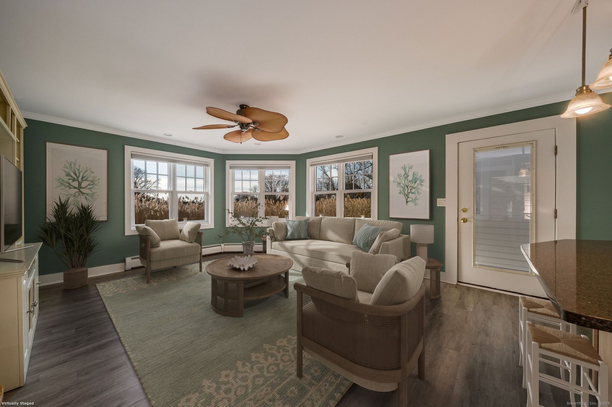 90 Boston Post Road Madison, CT 06443 - Photo 11 of 38 a living room with furniture a flat screen tv and a large window