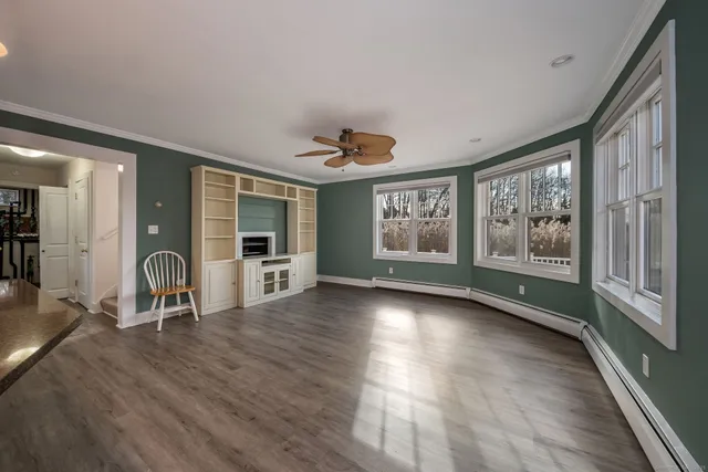 a view of workspace with furniture and window