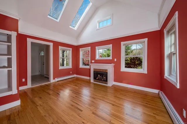 a view of livingroom with furniture window and fireplace