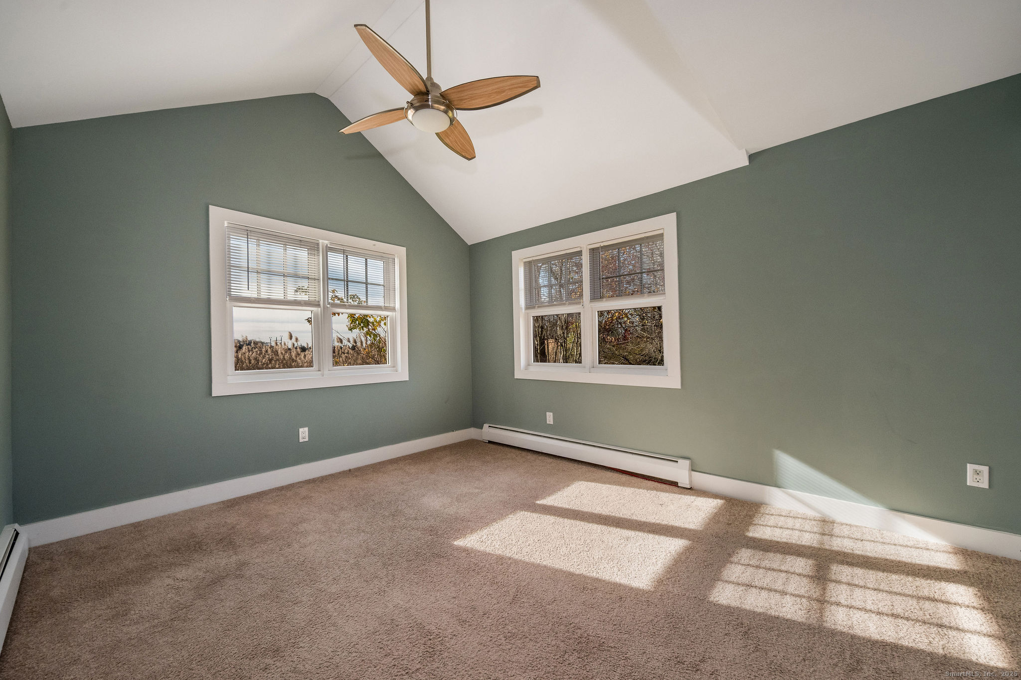 90 Boston Post Road Madison, CT 06443 - Photo 19 of 38 a view of room with window and ceiling fan