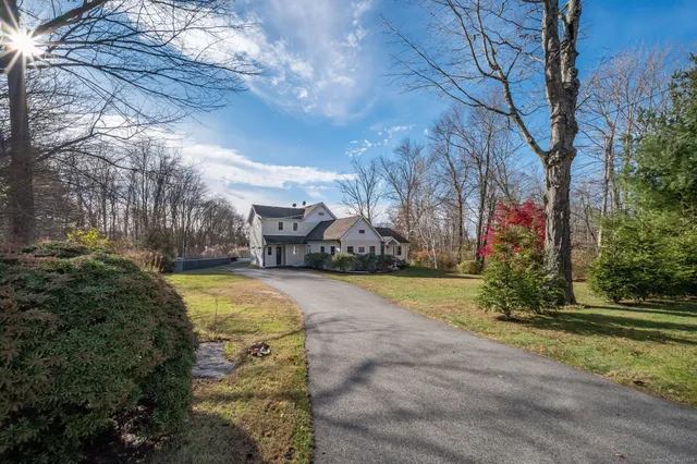 a view of yard with swimming pool