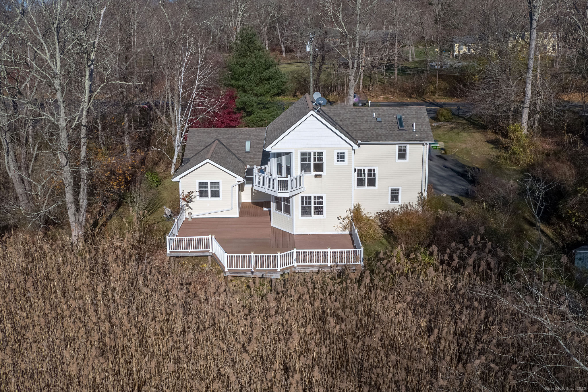 90 Boston Post Road Madison, CT 06443 - Photo 6 of 38 aerial view of a house with a yard