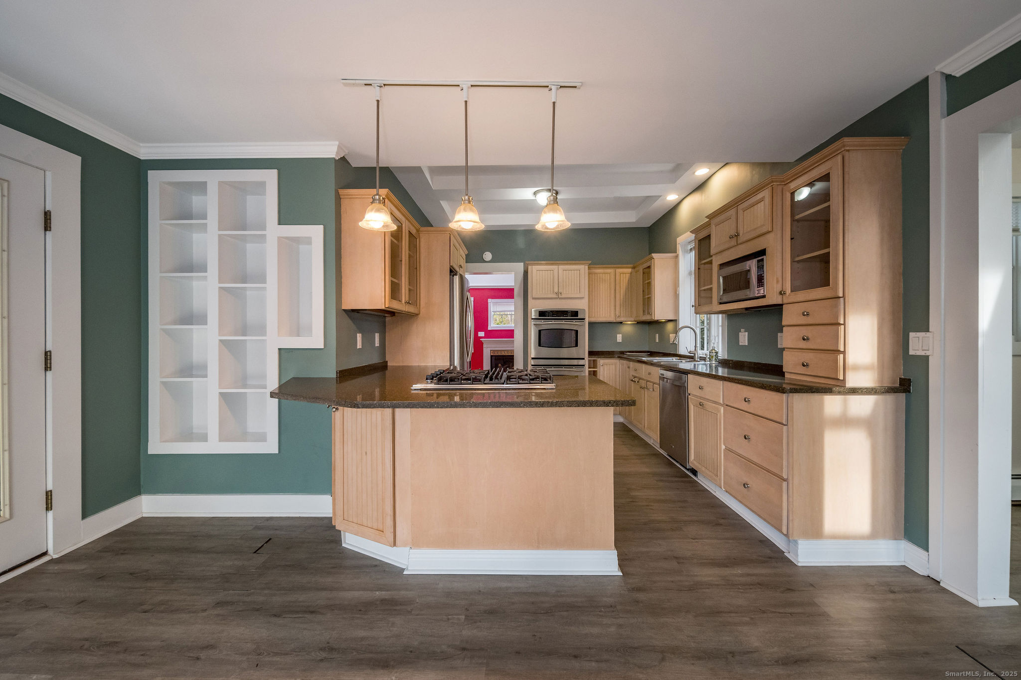 90 Boston Post Road Madison, CT 06443 - Photo 9 of 38 a kitchen with stainless steel appliances granite countertop a refrigerator a sink dishwasher a oven and a dining table with wooden floor