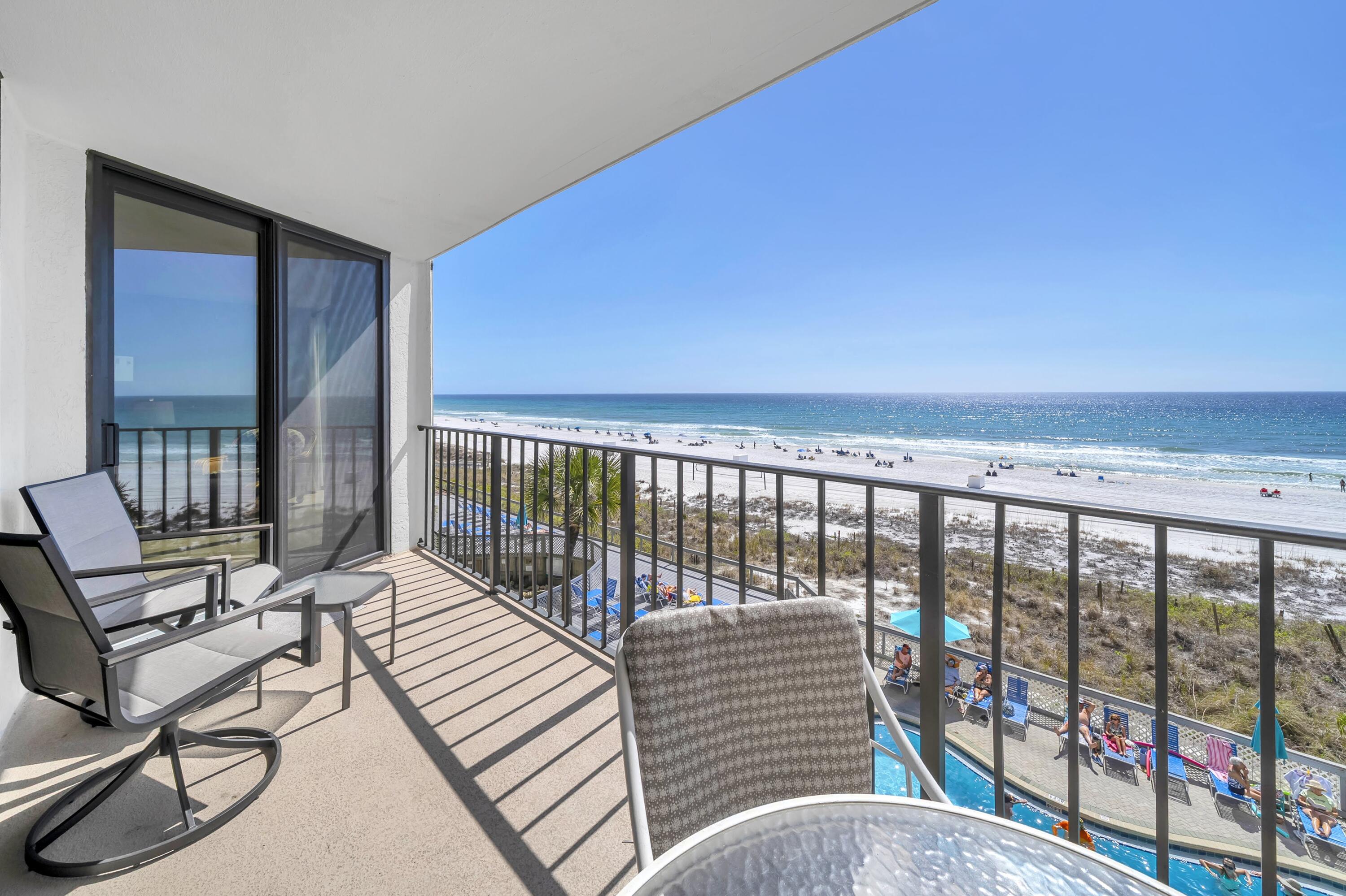 11619 Front Beach Road, Unit 307 Panama City Beach, FL 32407 - Photo 12 of 48 a view of a balcony with chairs
