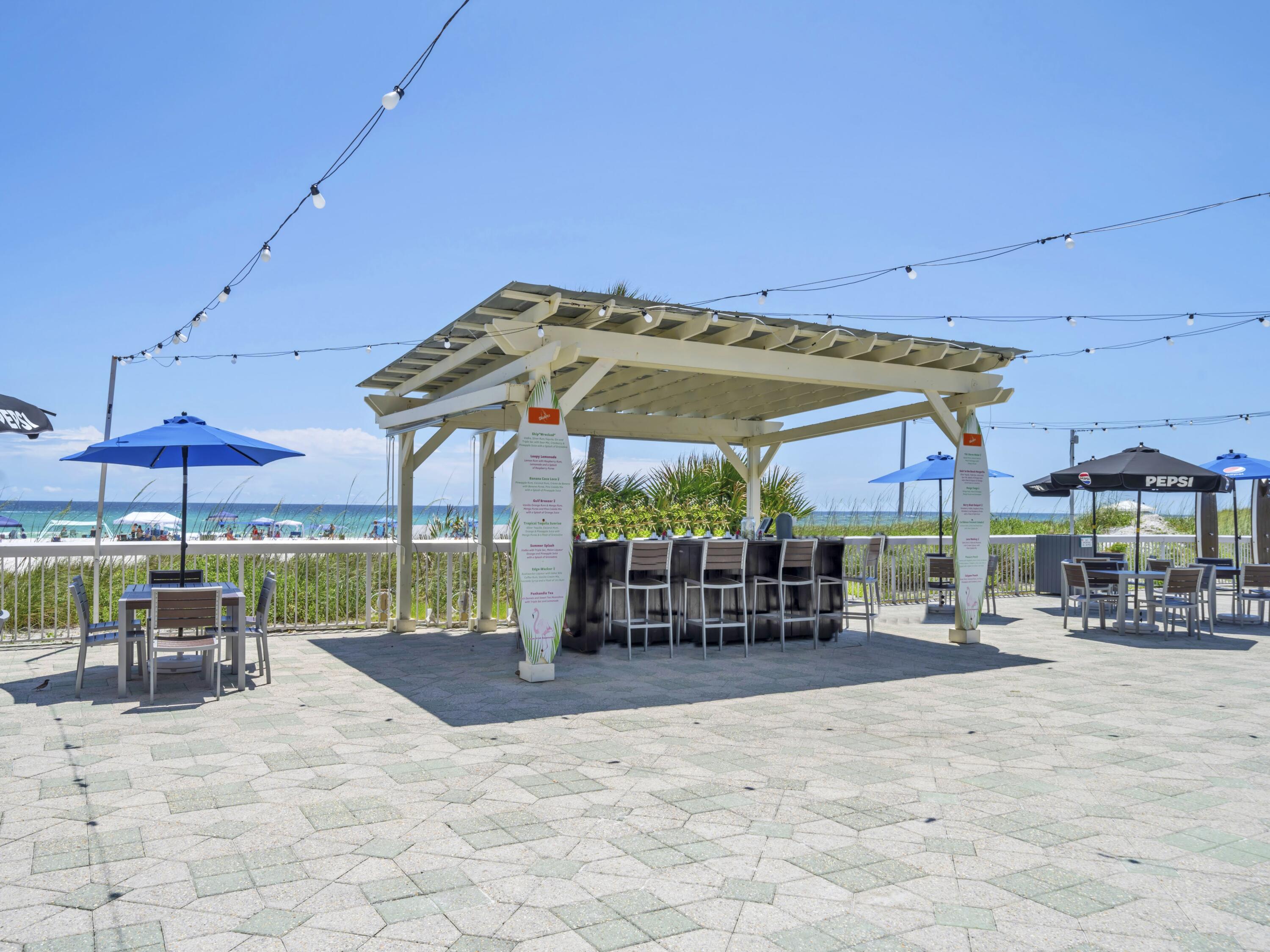 11619 Front Beach Road, Unit 307 Panama City Beach, FL 32407 - Photo 41 of 48 an outdoor space with seating space