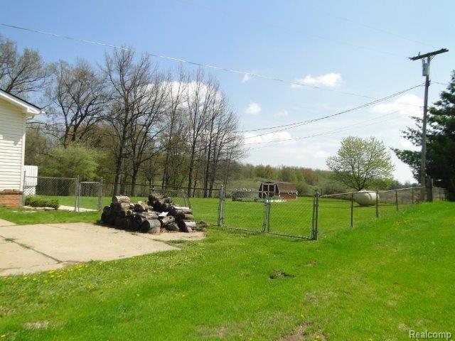 3401 Green Corners Road Lapeer, MI 48446 - Photo 26 of 29 Fenced Back yard 2.jpg