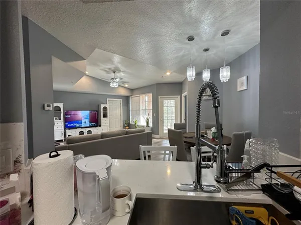 a view of a dining room with furniture