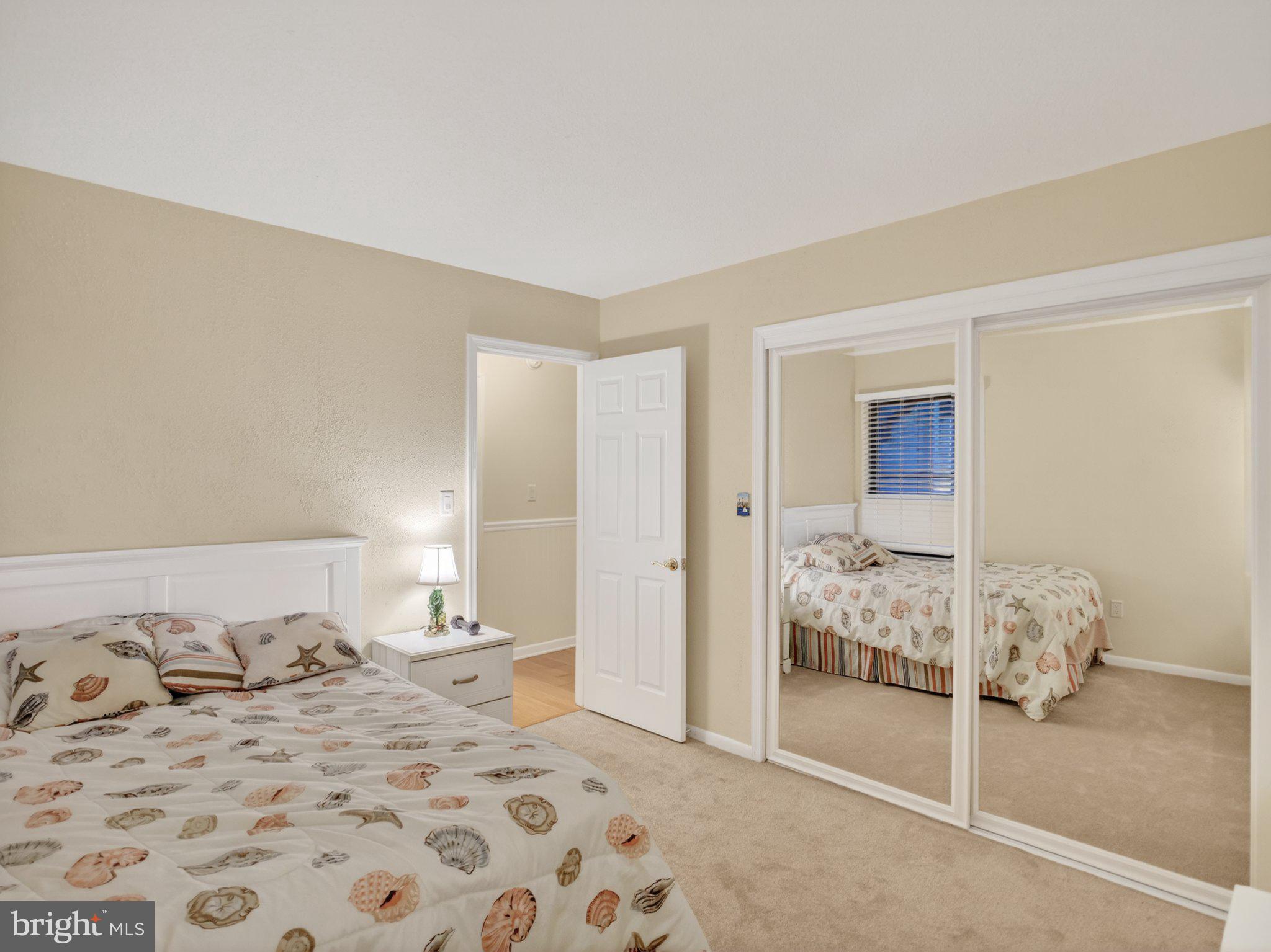 103 Channel Buoy Road Ocean City, MD 21842 - Photo 21 of 29 Cozy retreat with mirrored elegance.