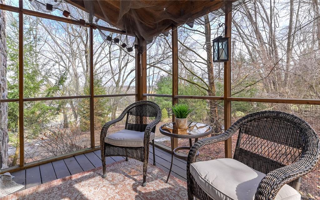 110 Butler Street Extension Valencia, PA 16059 - Photo 21 of 48 Screened in side porch from the first floor bedroom