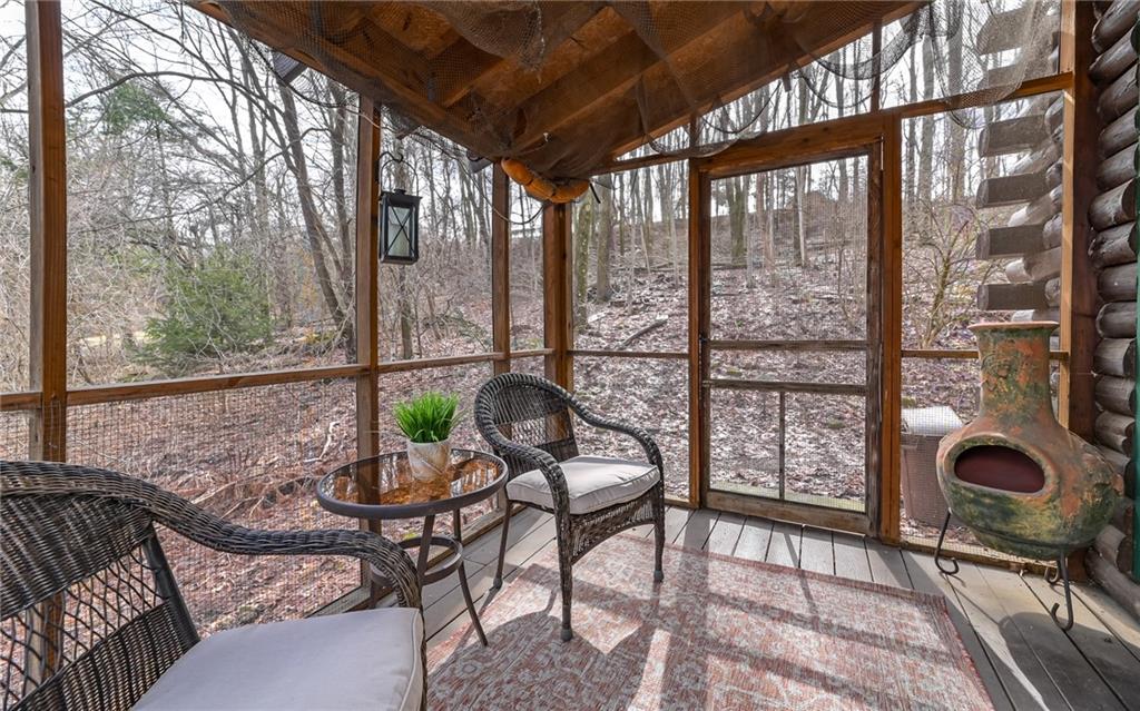 110 Butler Street Extension Valencia, PA 16059 - Photo 22 of 48 Screened in side porch