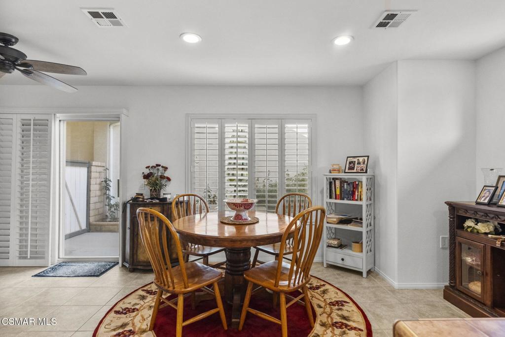 2046 Freesia Avenue Simi Valley, CA 93063 - Photo 15 of 37 a view of a dining room with furniture and a window