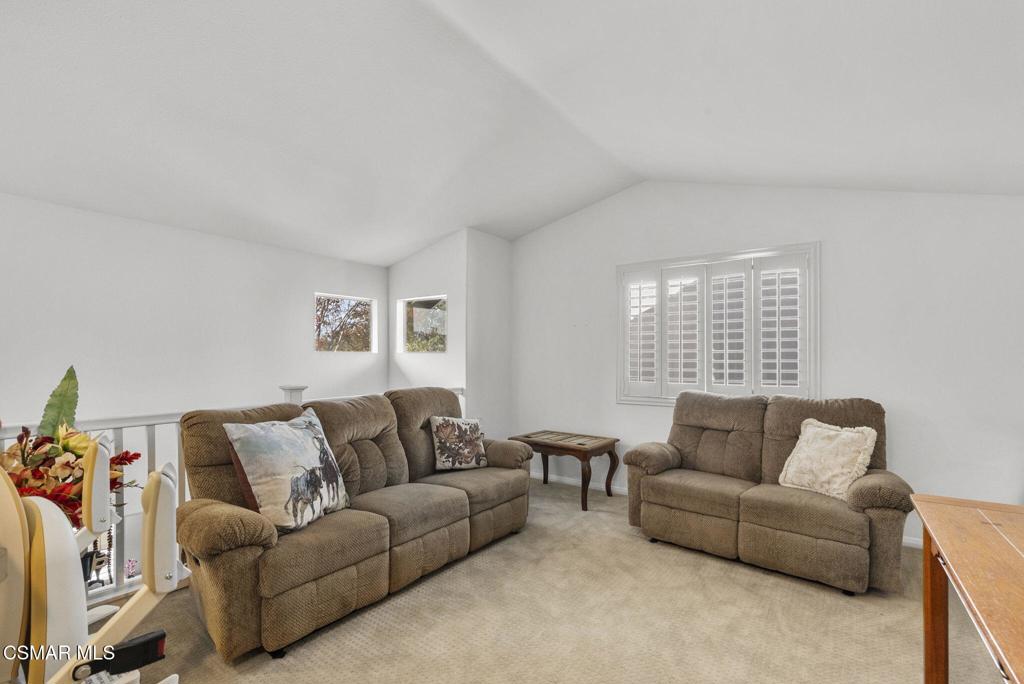 2046 Freesia Avenue Simi Valley, CA 93063 - Photo 25 of 37 a living room with furniture and a window