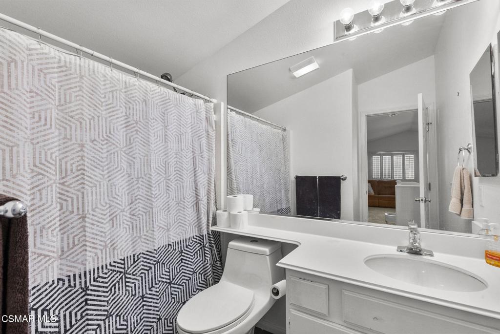 2046 Freesia Avenue Simi Valley, CA 93063 - Photo 29 of 37 a bathroom with a sink toilet and shower