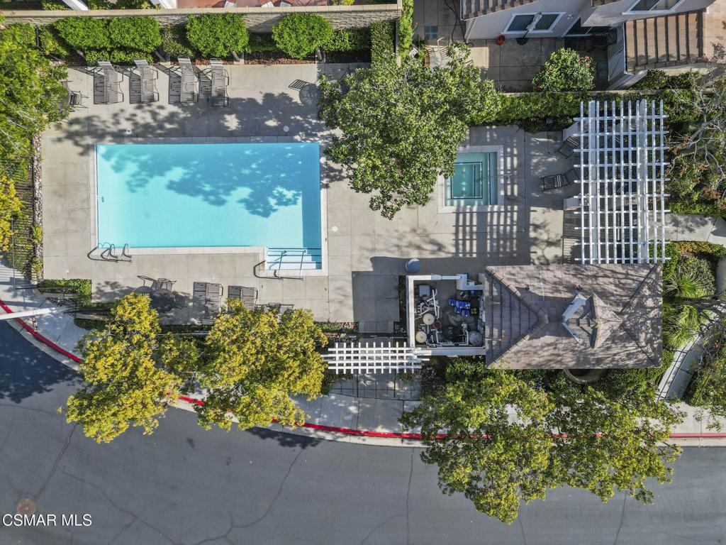 2046 Freesia Avenue Simi Valley, CA 93063 - Photo 34 of 37 a view of a house with a flower garden