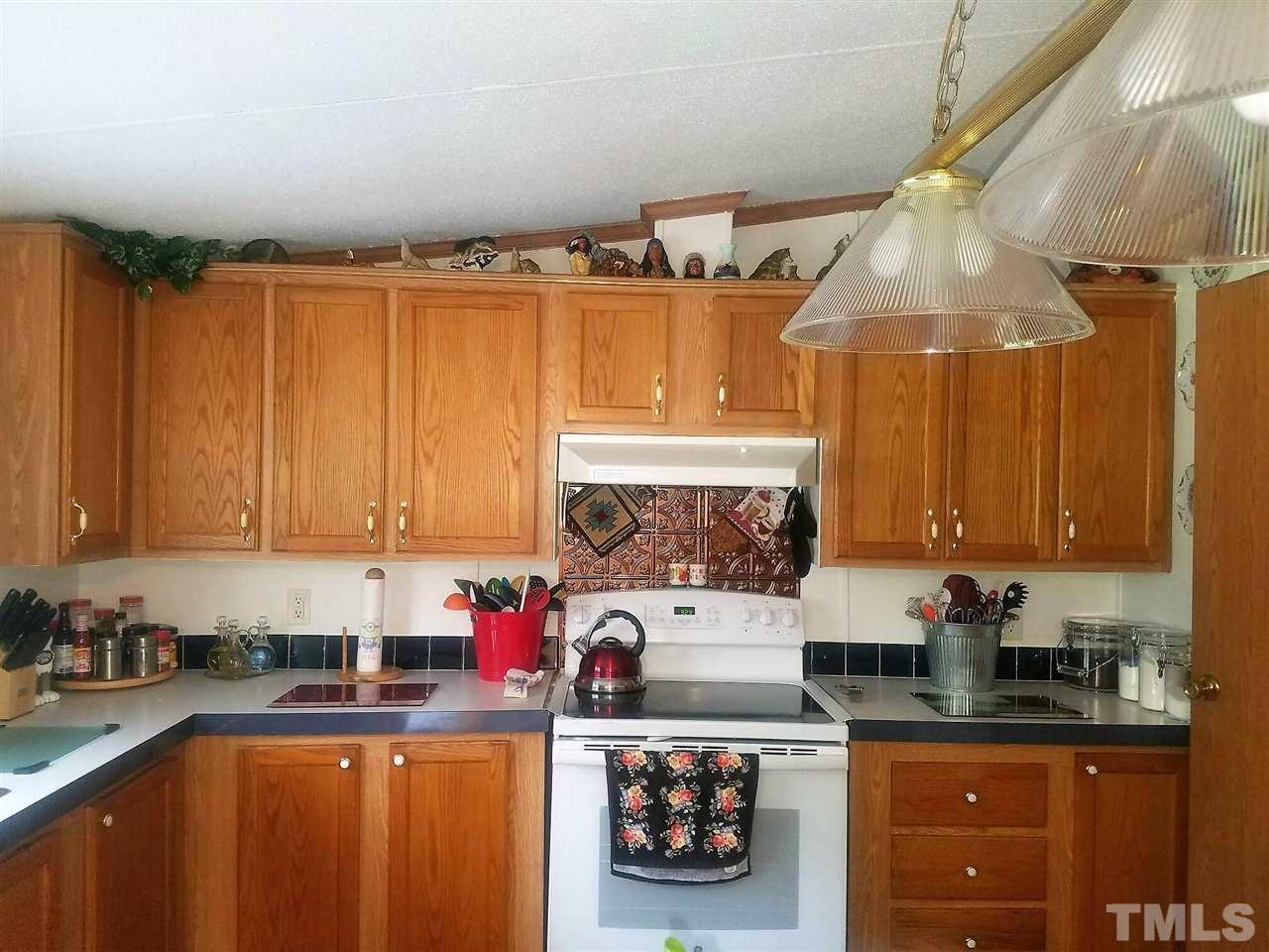 1232 Roffler Street Garner, NC 27529 - Photo 3 of 22 Spacious Kitchen with center island. and Pantry