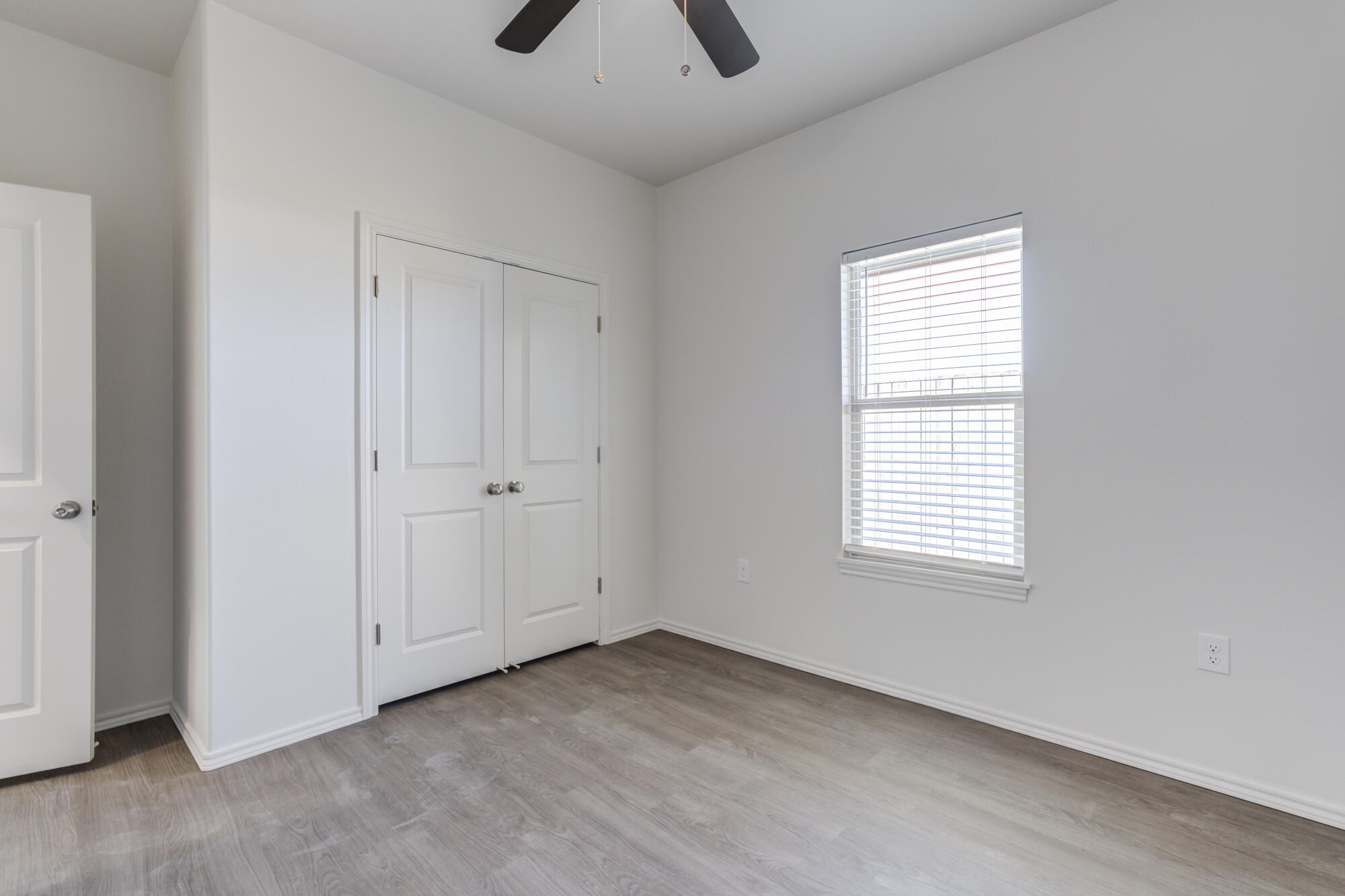 7011 40th Street Lubbock, TX 79407 - Photo 20 of 32 an empty room with windows