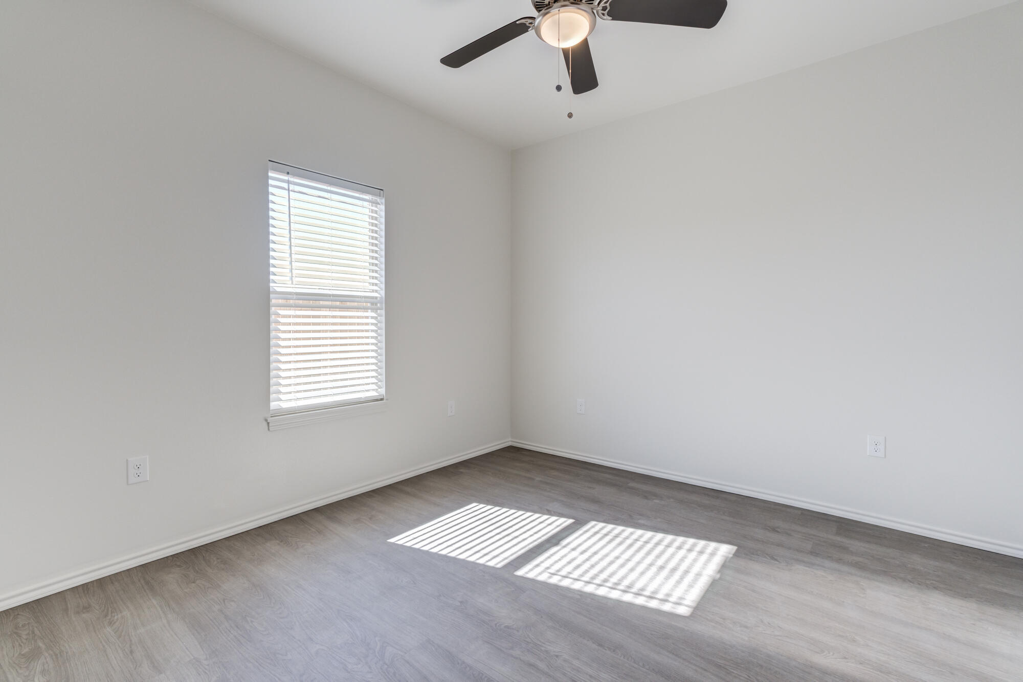 7011 40th Street Lubbock, TX 79407 - Photo 23 of 32 an empty room with a window