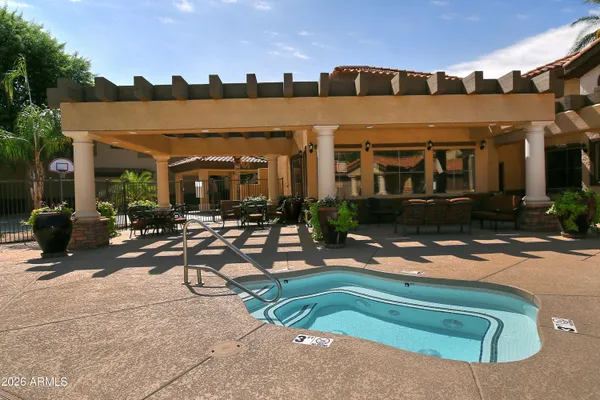 a view of a street with brick building in the background