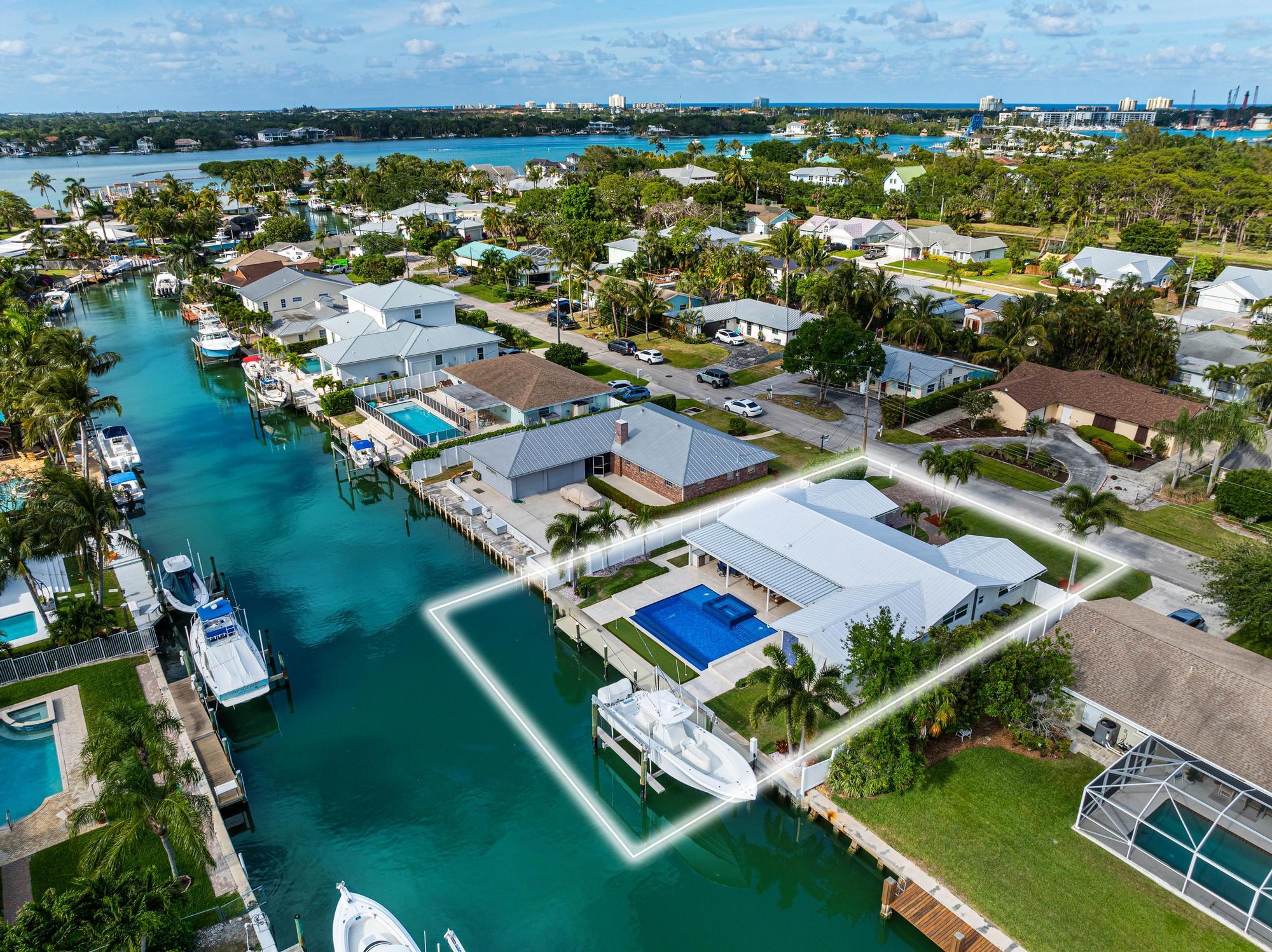 932 Marlin Circle Jupiter, FL 33458 - Photo 49 of 56 an aerial view of residential houses with outdoor space