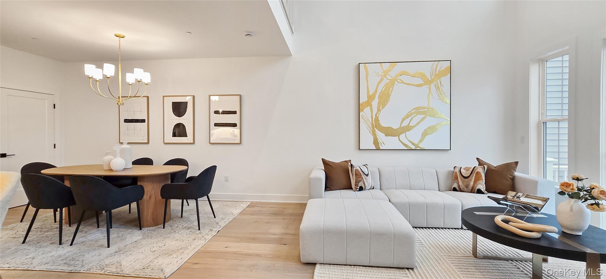 2088 Summit Loop, Unit 79 Carmel, NY 10512 - Photo 6 of 16 a bedroom with furniture and wooden floor