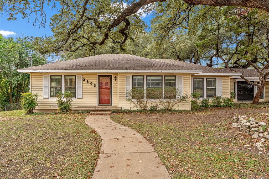 3808 North 27th Street Waco, TX 76708 - Photo 15 of 39 front view of a house with a yard