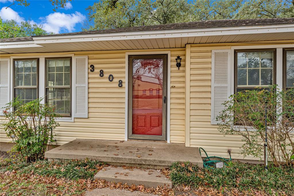 3808 North 27th Street Waco, TX 76708 - Photo 16 of 39 a front view of a house with a garden
