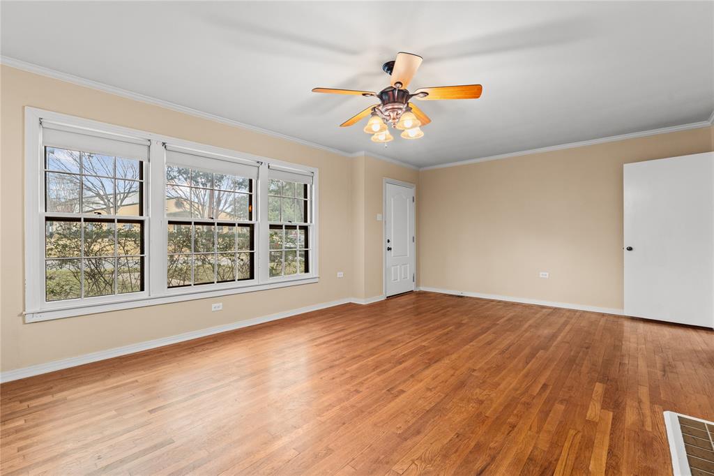 3808 North 27th Street Waco, TX 76708 - Photo 18 of 39 a view of an empty room with wooden floor and a window