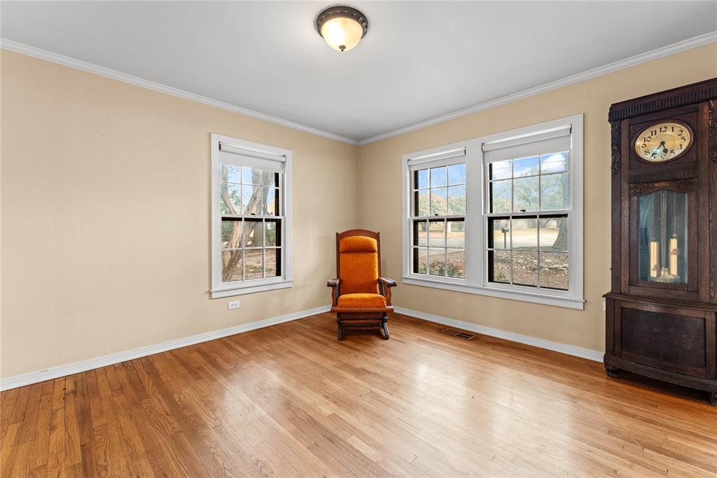3808 North 27th Street Waco, TX 76708 - Photo 25 of 39 a living room with furniture and a window
