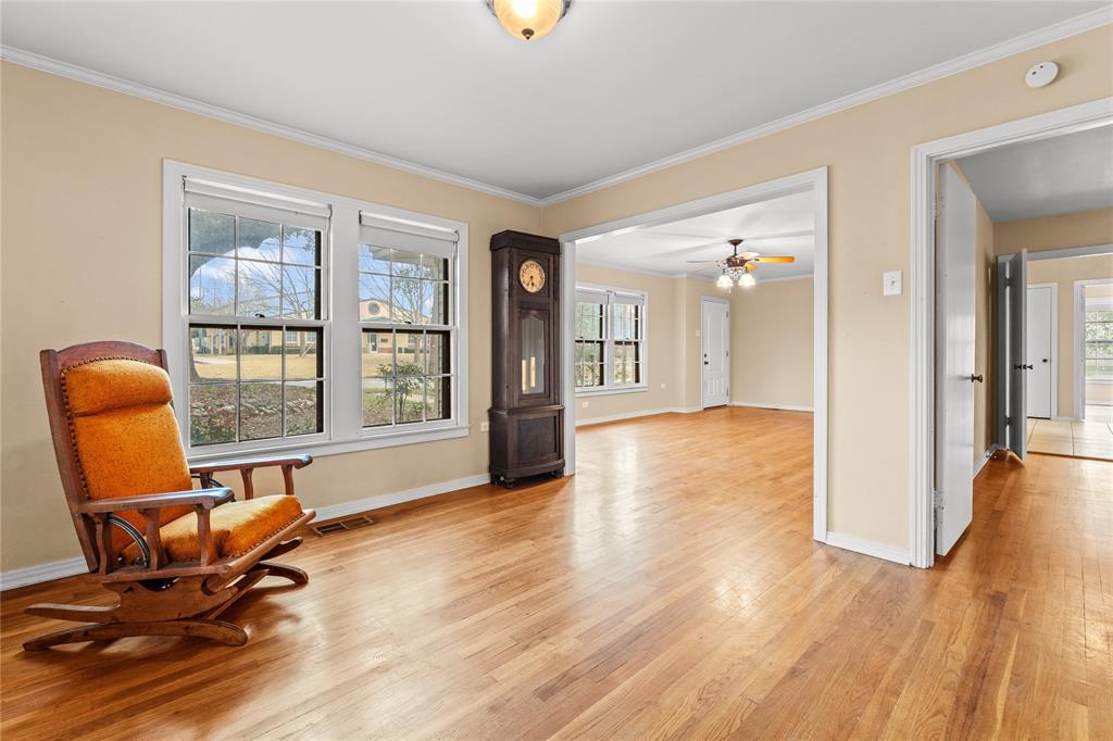 3808 North 27th Street Waco, TX 76708 - Photo 26 of 39 a view of a livingroom with workspace and a window
