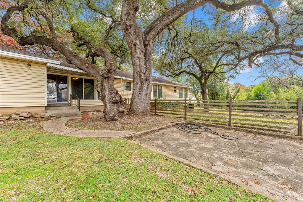 3808 North 27th Street Waco, TX 76708 - Photo 35 of 39 a view of a house with a yard